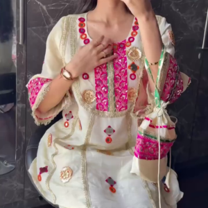 Beige Mirror Work Kurta Set with Pink Accents & Potli Bag